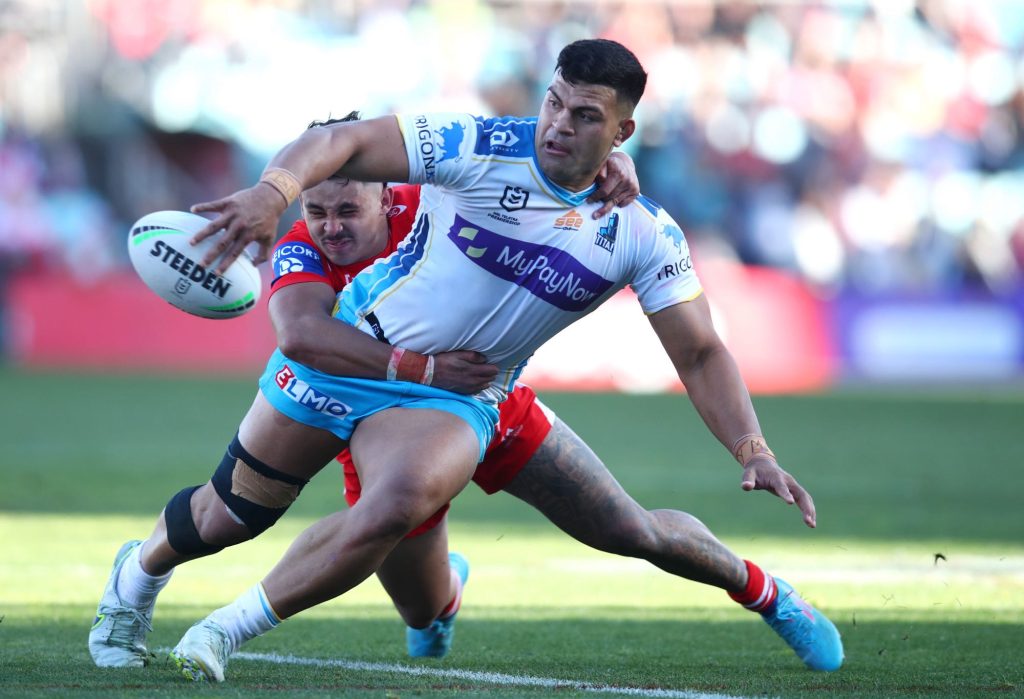 David Fifita of the Titans offloads during the round 23 NRL match between the St George Illawarra Dragons and the Gold Coast Titans at WIN Stadium on August 21, 2022 in Wollongong, Australia. (Photo by Jason McCawley/Getty Images)